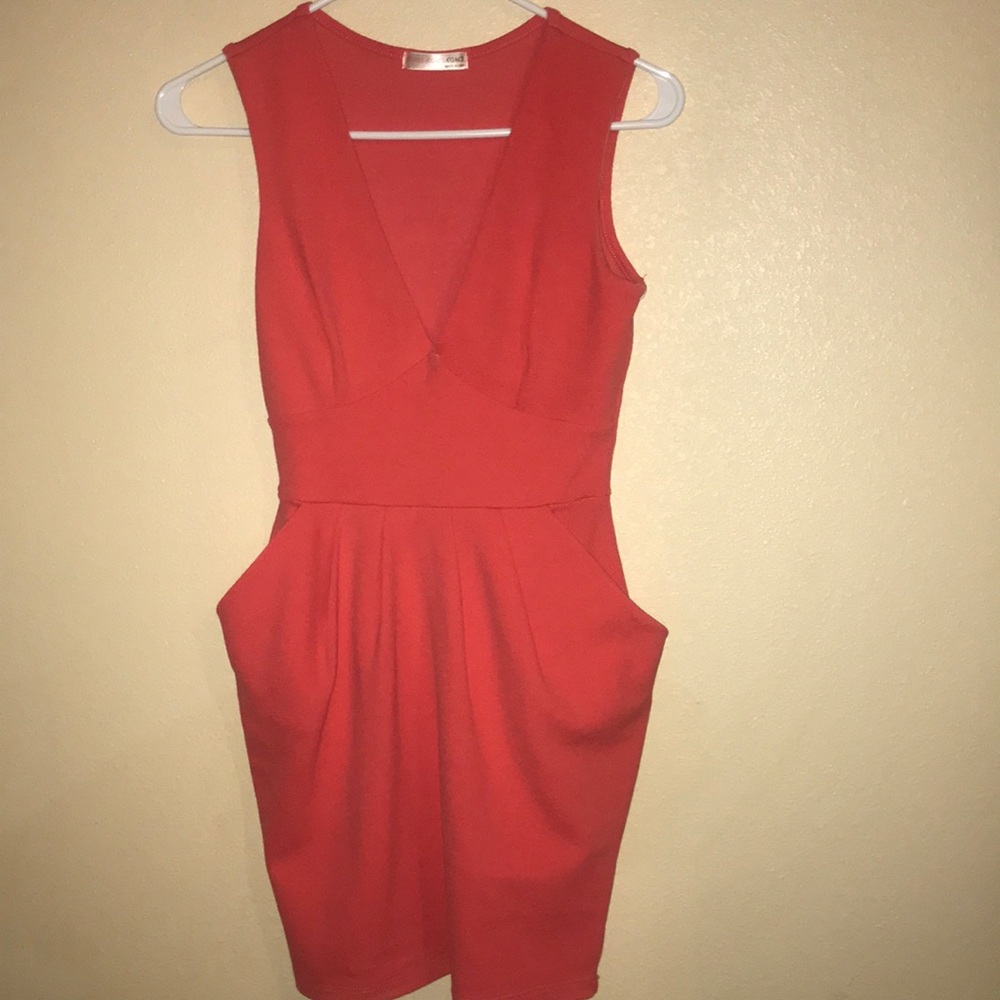 Pink deep v dress with pockets size small